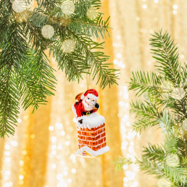 Santa in chimney Christmas bauble